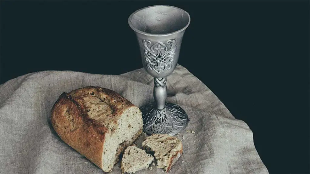 sliced bread and goblet for Christian communion eucharist